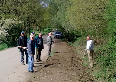 Re-seeding the verge at the bottom of Baker's Hill